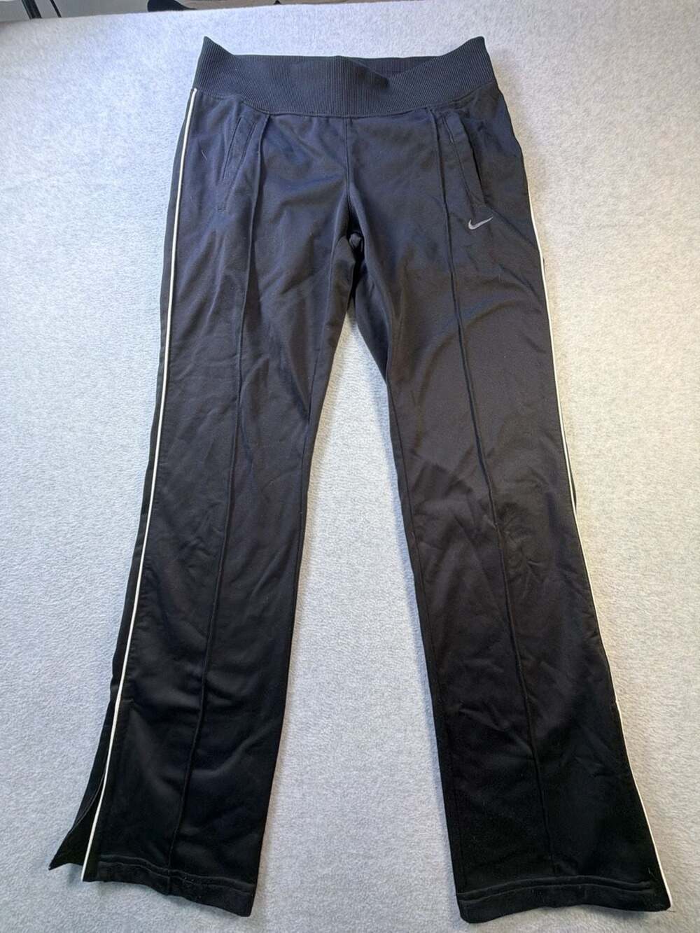 Nike Women's Black Athletic Track Pants with Side Piping and Zip Cuffs